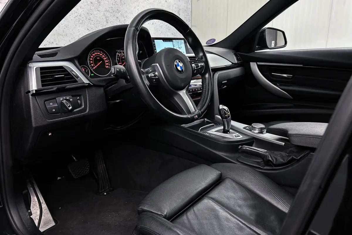 330e Centennial M-sport | Camera | Lederen bekleding | Schuif-/kanteldak