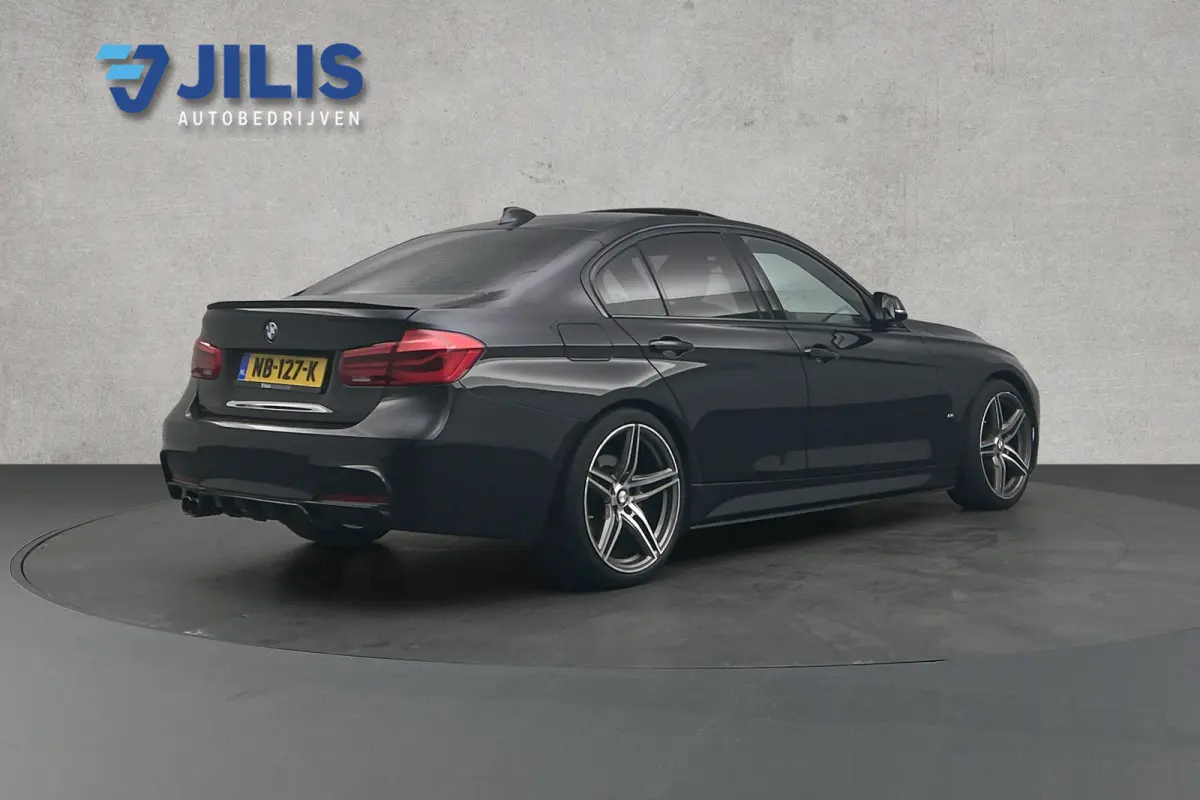 330e Centennial M-sport | Camera | Lederen bekleding | Schuif-/kanteldak