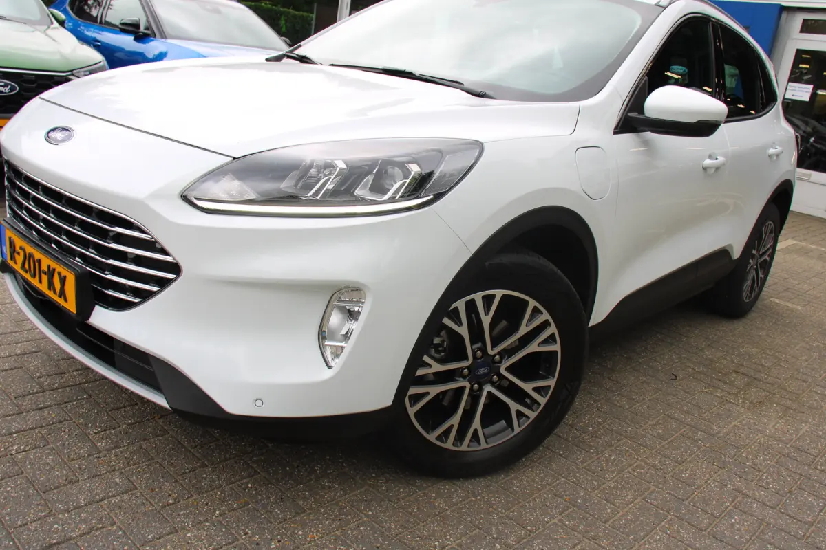 2.5 PHEV Titanium | NL-AUTO! | 1E EIGENAAR! | CAMERA | WINTERPACK | CRUISE | LANE ASSIST | PARK SENS V+A | NAVI | CLIMA