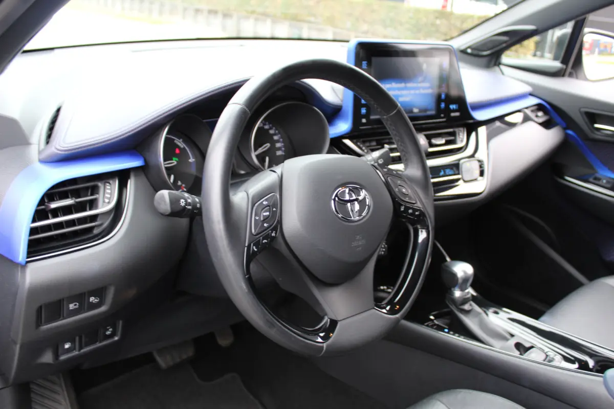 1.8 Hybrid Bi-Tone Plus | Dealer onderhouden
