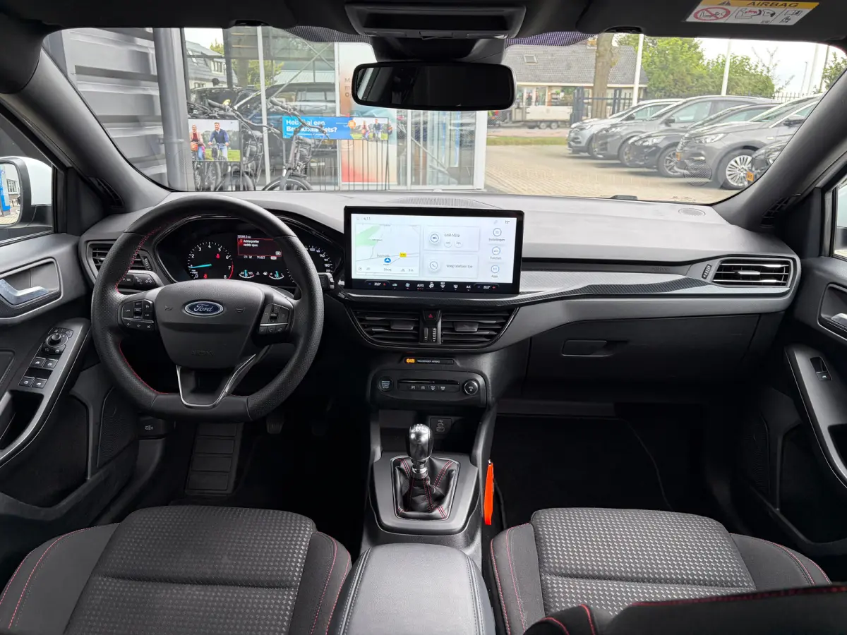 1.0 Hybrid 125 PK ST Line | NAVIGATIE + APPLE CARPLAY/ANDROID AUTO| PARKEERSENSOREN V+A| FULL LED| KEYLESS START| SPORTSTOELEN| 17" LM-VELGEN| LENDESTEUNEN VERSTELBAAR| DAB| DEALER ONDERHOUD
