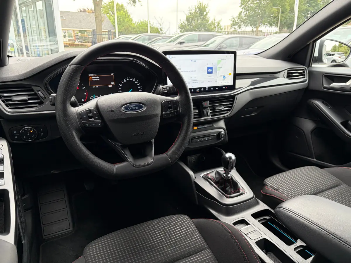 1.0 Hybrid 125 PK ST Line | NAVIGATIE + APPLE CARPLAY/ANDROID AUTO| PARKEERSENSOREN V+A| FULL LED| KEYLESS START| SPORTSTOELEN| 17" LM-VELGEN| LENDESTEUNEN VERSTELBAAR| DAB| DEALER ONDERHOUD