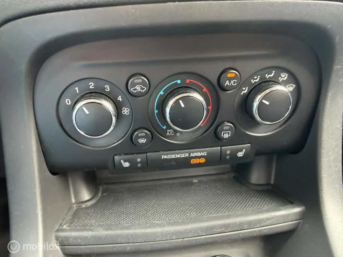 1.2 Titanium Ultimate White airco cruise Parkeersensoren km