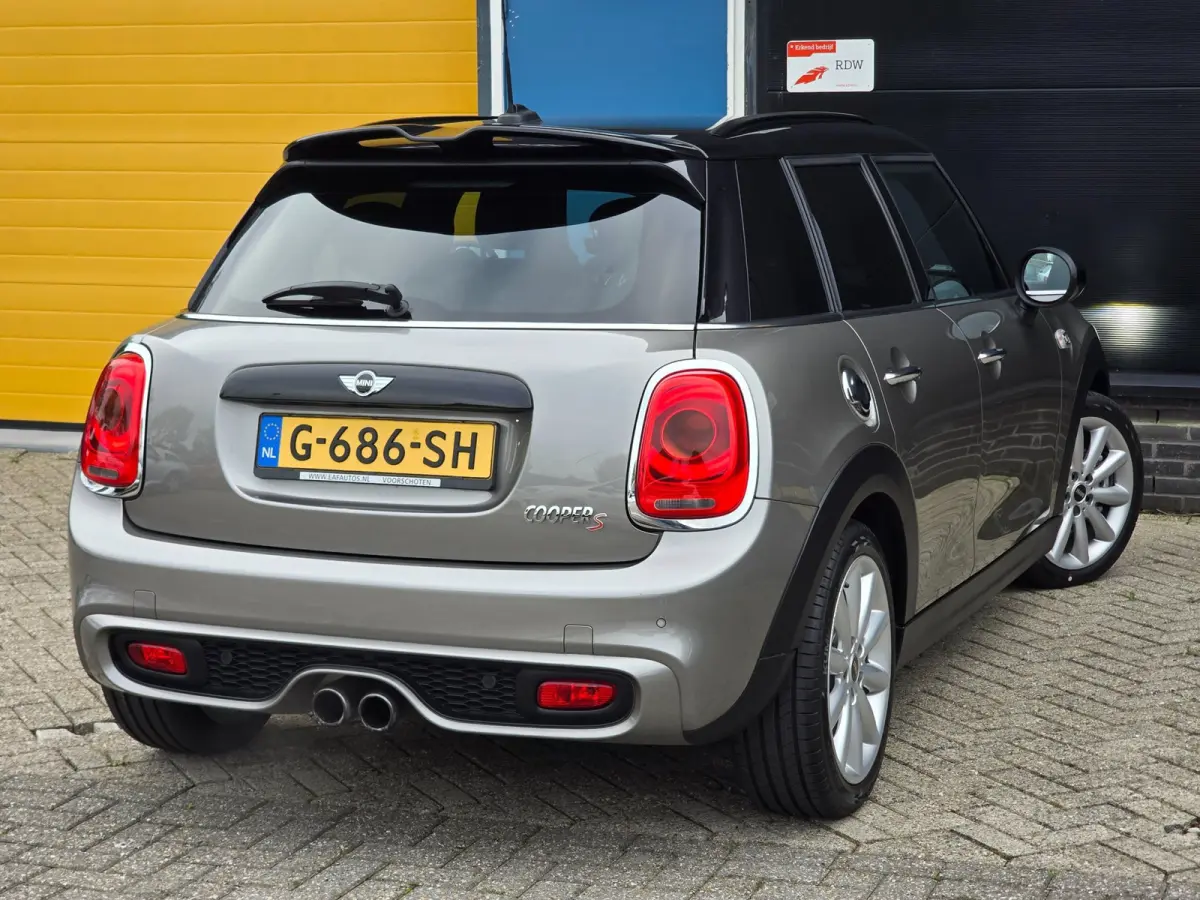 2.0 Cooper S Chili Serious Business / AUT / 5 Deurs / Navi / Head Up / Harman Kardon / Stoelverwarming / Led / Pdc