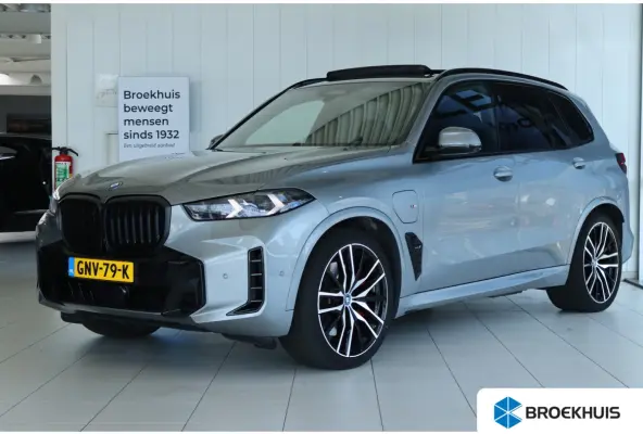 xDrive50e M-Sport Pro | Adapt. Cruise | Competition Stoelen | Carbon | Massage | Softclose | 4-wielsturing | Trekhaak | Pano | Harman & Kardon | HUD