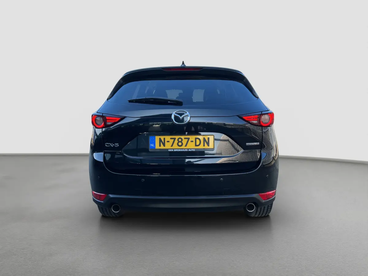 2.0 SkyActiv-G 165 Newground Automaat | 360 graden camera | Adaptive cruise control | Elektrische achterklep | Bestuurdersstoel met geheugen | Half leder | Stoelverwarming | Dodehoek detecti