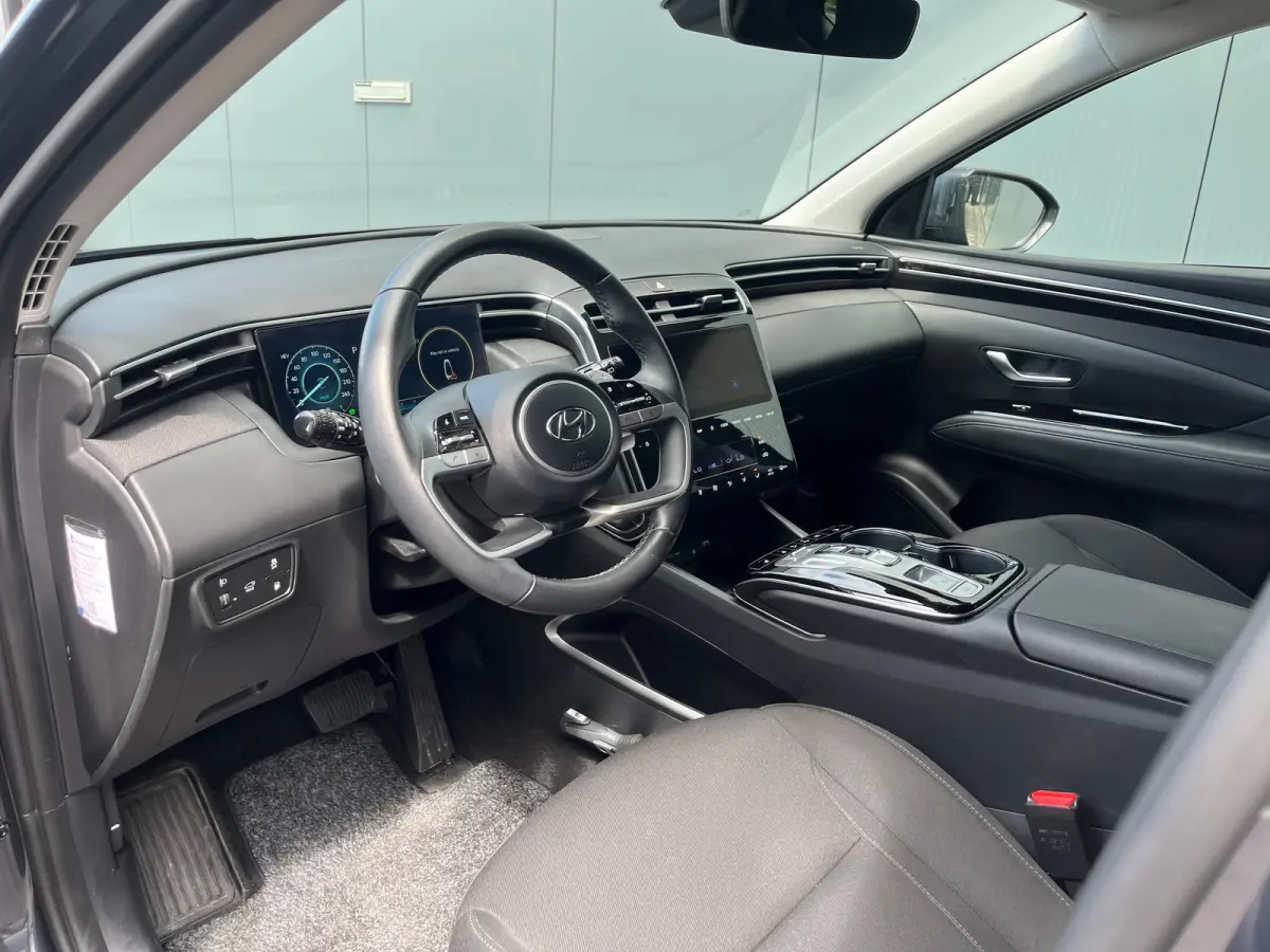 1.6 T-GDI 265pk PHEV Comfort Smart 4WD | Climate | Camera | Carplay | Keyless | Navigatie | Full - Led | Elek. Klep | Winterpakket | 19" Lichtmetaal | Digitale Cockpit | Parkeer Assistent | 