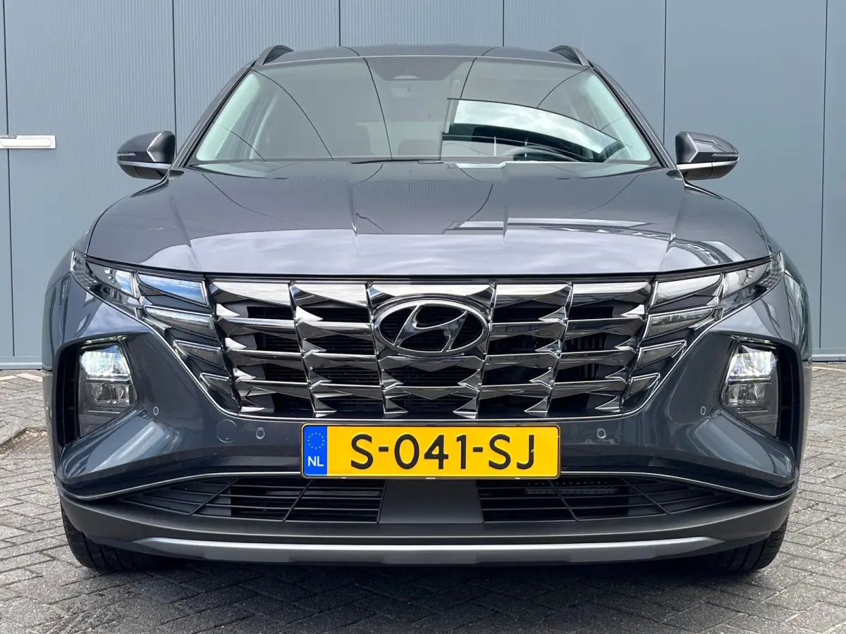 1.6 T-GDI 265pk PHEV Comfort Smart 4WD | Climate | Camera | Carplay | Keyless | Navigatie | Full - Led | Elek. Klep | Winterpakket | 19" Lichtmetaal | Digitale Cockpit | Parkeer Assistent | 