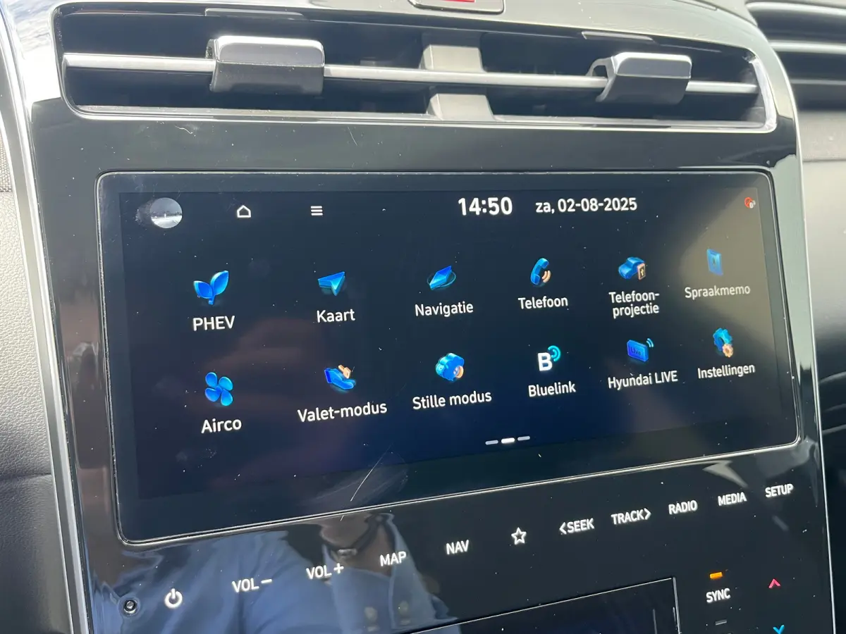 1.6 T-GDI 265pk PHEV Comfort Smart 4WD | Climate | Camera | Carplay | Keyless | Navigatie | Full - Led | Elek. Klep | Winterpakket | 19" Lichtmetaal | Digitale Cockpit | Parkeer Assistent | 