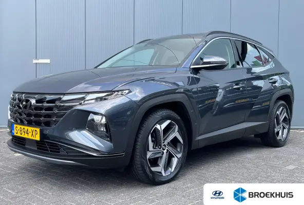 1.6 T-GDI 265pk PHEV Comfort Smart 4WD | Climate | Camera | Carplay | Keyless | Navigatie | Full - Led | Elek. Klep | Winterpakket | 19" Lichtmetaal | Krell Audio | Digitale Cockpit | Parkee