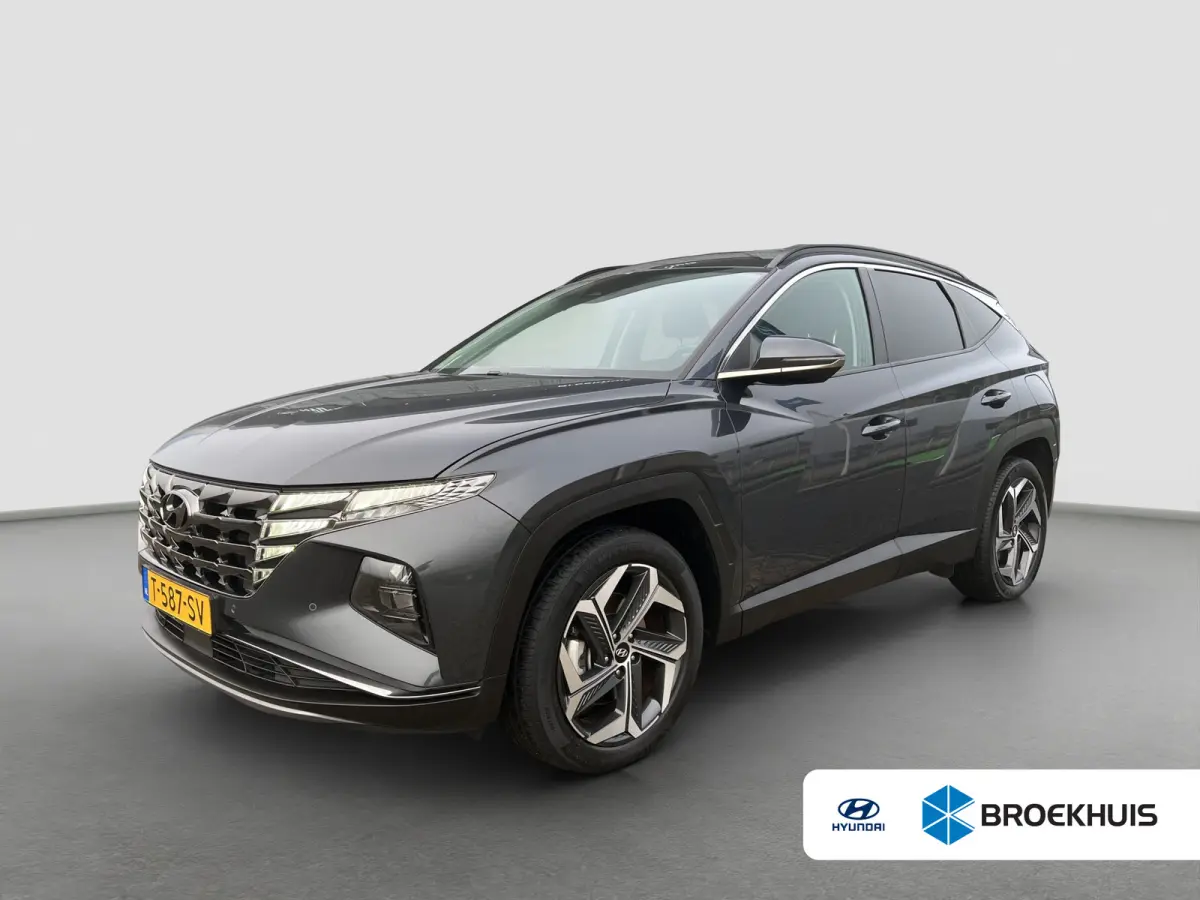 1.6 T-GDI 265pk PHEV Comfort Smart 4WD | Climate | Camera | Carplay | Keyless | Navigatie | Full - Led | Elek. Klep | Winterpakket | 19" Lichtmetaal | Krell Audio | Digitale Cockpit | Parkee