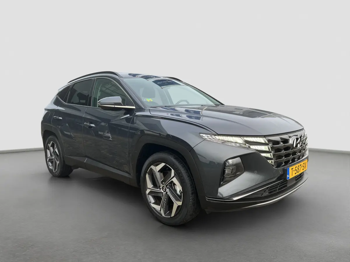 1.6 T-GDI 265pk PHEV Comfort Smart 4WD | Climate | Camera | Carplay | Keyless | Navigatie | Full - Led | Elek. Klep | Winterpakket | 19" Lichtmetaal | Krell Audio | Digitale Cockpit | Parkee