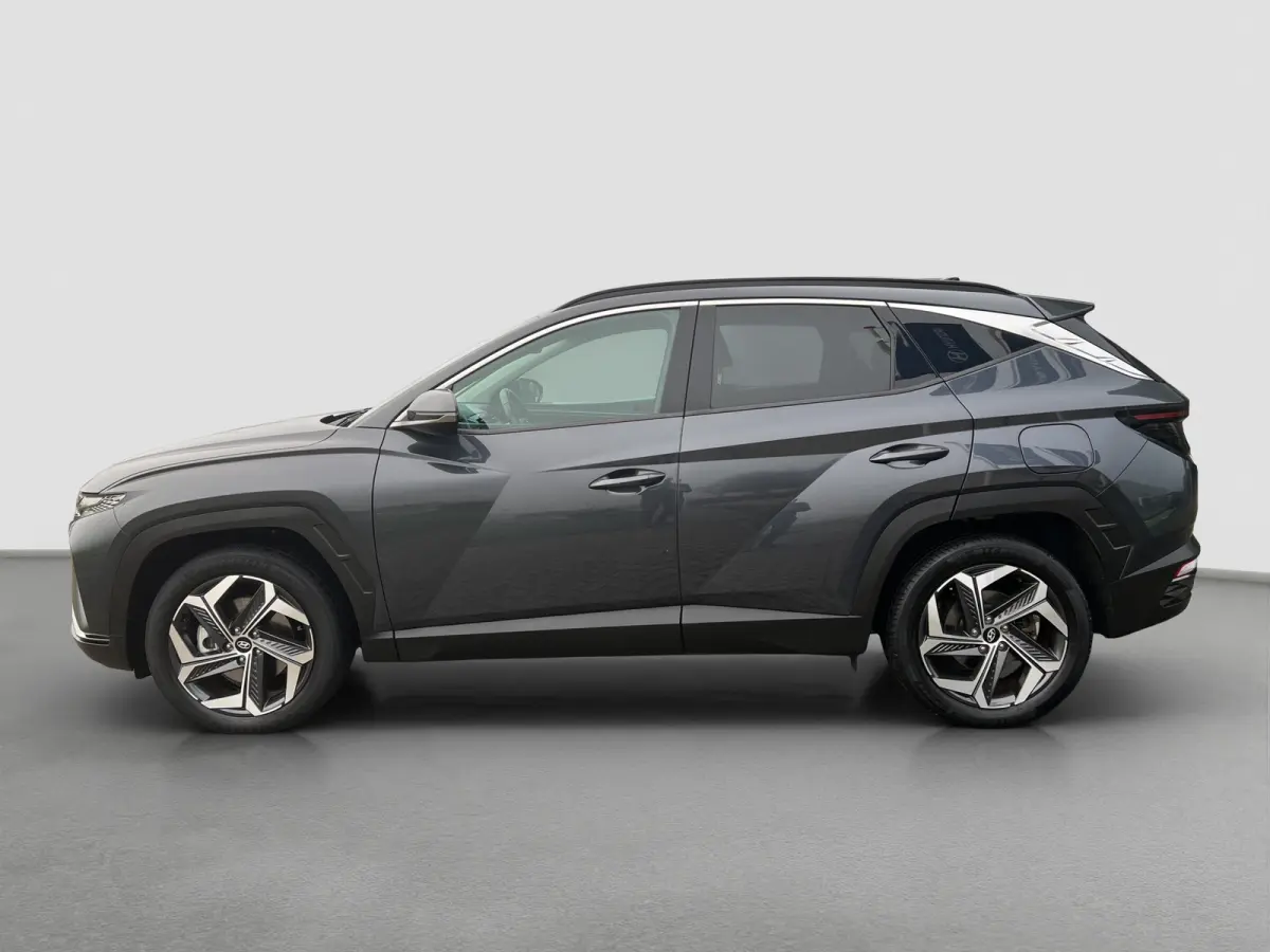 1.6 T-GDI 265pk PHEV Comfort Smart 4WD | Climate | Camera | Carplay | Keyless | Navigatie | Full - Led | Elek. Klep | Winterpakket | 19" Lichtmetaal | Krell Audio | Digitale Cockpit | Parkee