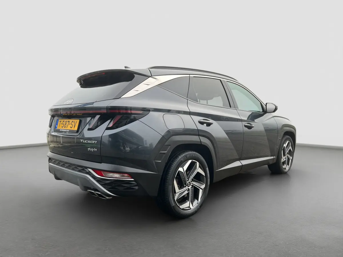 1.6 T-GDI 265pk PHEV Comfort Smart 4WD | Climate | Camera | Carplay | Keyless | Navigatie | Full - Led | Elek. Klep | Winterpakket | 19" Lichtmetaal | Krell Audio | Digitale Cockpit | Parkee