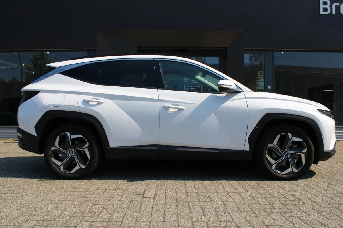 1.6 T-GDI PHEV Comfort Smart 4WD PHEV 265pk 4WD | Achteruitrijcamera | Actieve rijbaanassistentie (LKA) | Apple Carplay/Android Auto|telefoonintegratie premium