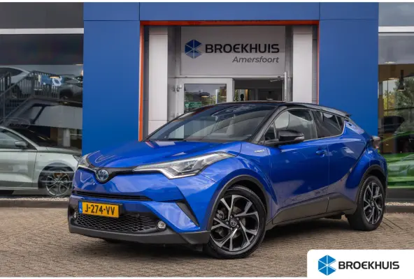 1.8 Hybrid Bi-Tone | Cruise control adaptief | Cruise Control | Stoelverwarming | Parkeersensoren Voor/Achter | | Achteruitrijcamera | Cruise control adaptief | Lichtmetalen velgen 18"