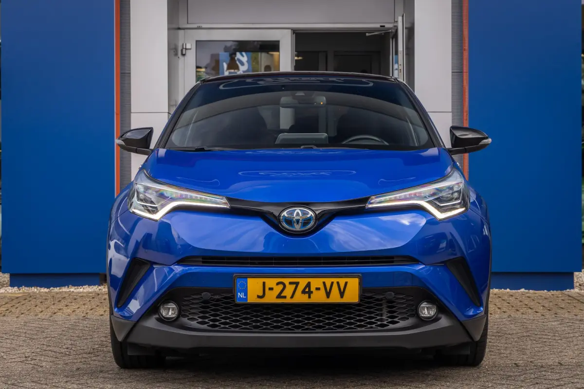 1.8 Hybrid Bi-Tone | Cruise control adaptief | Cruise Control | Stoelverwarming | Parkeersensoren Voor/Achter | | Achteruitrijcamera | Cruise control adaptief | Lichtmetalen velgen 18"