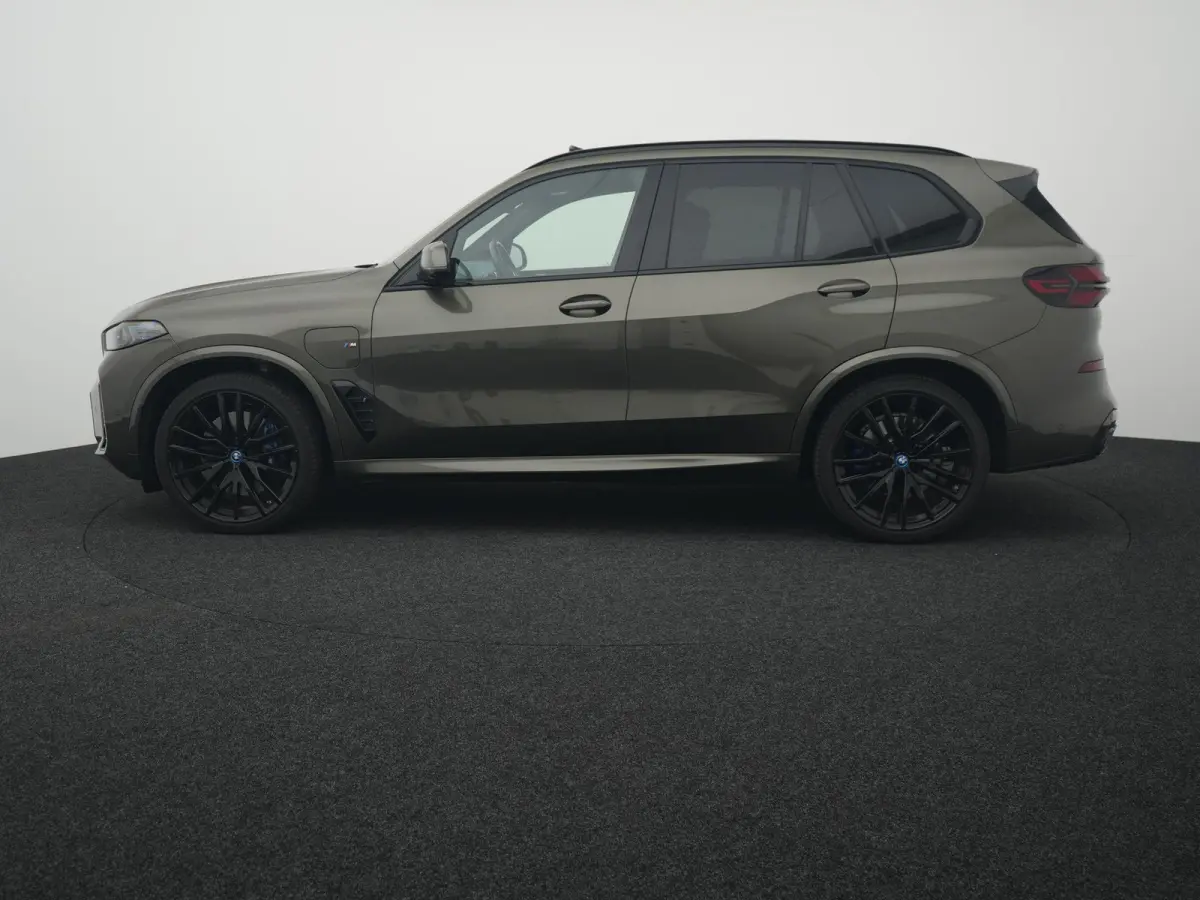xDrive50e Launch Edition BTW AUTO | PANORAMADAK | LUCHTVERING | HARMAN KARDON | STOELKOELING & VERWARMING | MASSAGE | CARBON PAKKET | ALCANTARA HEMEL | TREKHAAK | MEMORY | HEAD-UP | ADAPTIEV