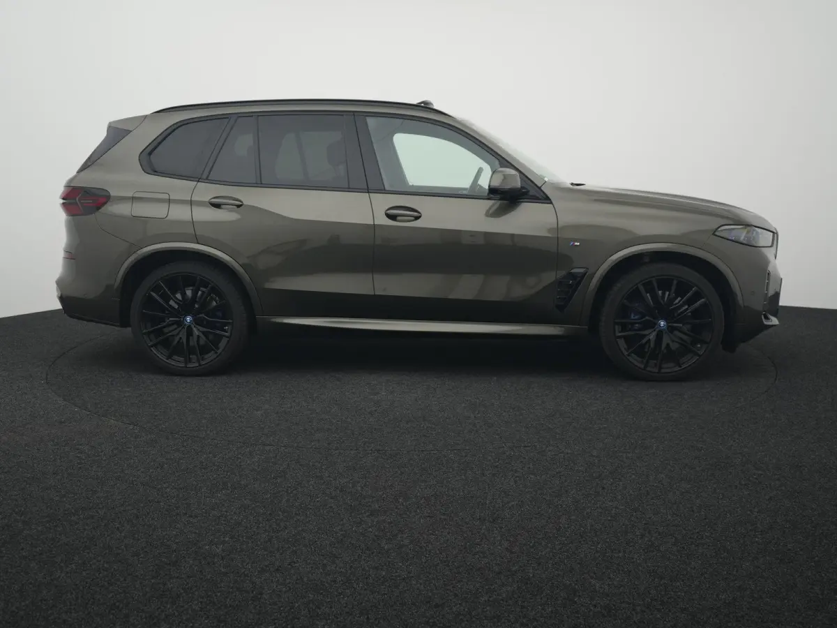 xDrive50e Launch Edition BTW AUTO | PANORAMADAK | LUCHTVERING | HARMAN KARDON | STOELKOELING & VERWARMING | MASSAGE | CARBON PAKKET | ALCANTARA HEMEL | TREKHAAK | MEMORY | HEAD-UP | ADAPTIEV