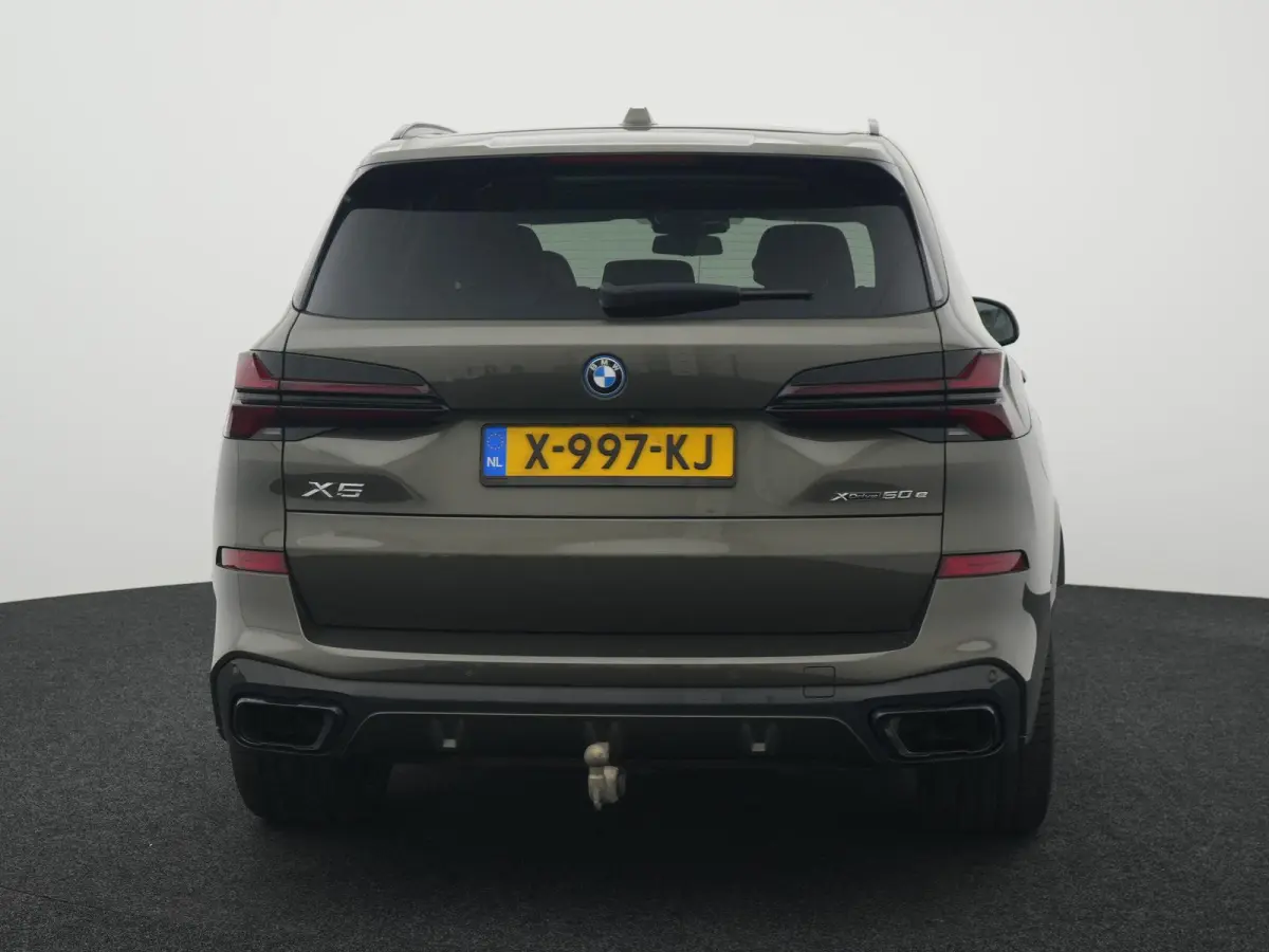 xDrive50e Launch Edition BTW AUTO | PANORAMADAK | LUCHTVERING | HARMAN KARDON | STOELKOELING & VERWARMING | MASSAGE | CARBON PAKKET | ALCANTARA HEMEL | TREKHAAK | MEMORY | HEAD-UP | ADAPTIEV