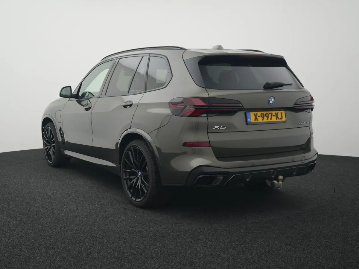 xDrive50e Launch Edition BTW AUTO | PANORAMADAK | LUCHTVERING | HARMAN KARDON | STOELKOELING & VERWARMING | MASSAGE | CARBON PAKKET | ALCANTARA HEMEL | TREKHAAK | MEMORY | HEAD-UP | ADAPTIEV