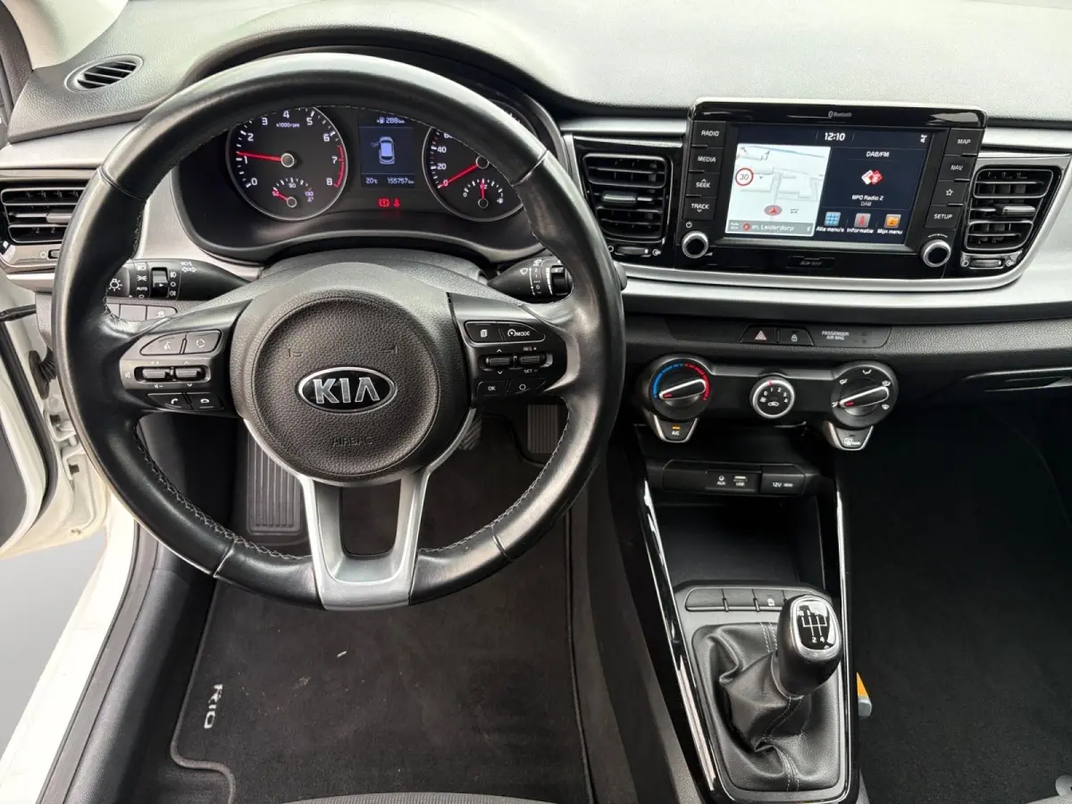 1.0 TGDI DynamicLine | Navigatie | Airco | Apple Carplay / Android Auto | Achterruitrij Camera | Lichtmetalen Velgen |