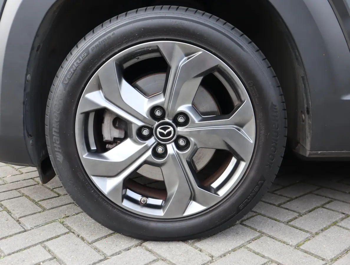e-SkyActiv 145 First Edition 36 kWh | SOH 94% | Voorstoelen verwarmd | HUD | Camera | Memory Seats