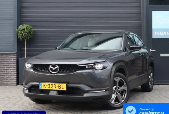 e-SkyActiv 145 First Edition 36 kWh | SOH 94% | Voorstoelen verwarmd | HUD | Camera | Memory Seats