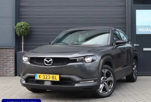 e-SkyActiv 145 First Edition 36 kWh | SOH 94% | Voorstoelen verwarmd | HUD | Camera | Memory Seats