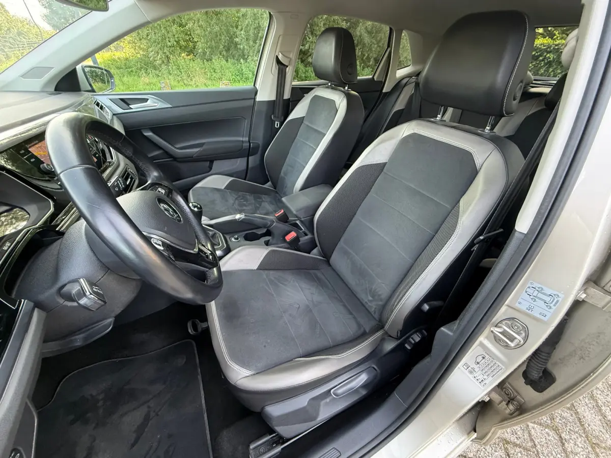 1.0 TSI R-LINE PDC I CARPLAY I CRUISE I LEER I CLIMA I 1E EIG I UNIEK