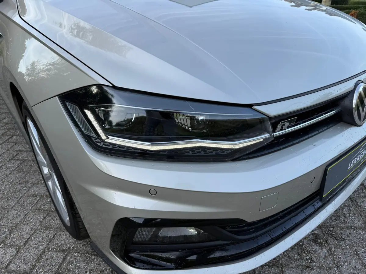 1.0 TSI R-LINE PDC I CARPLAY I CRUISE I LEER I CLIMA I 1E EIG I UNIEK