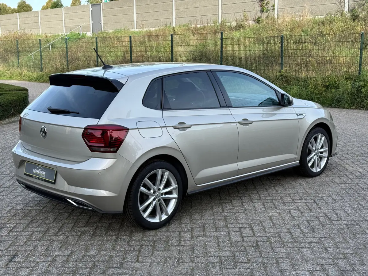1.0 TSI R-LINE PDC I CARPLAY I CRUISE I LEER I CLIMA I 1E EIG I UNIEK