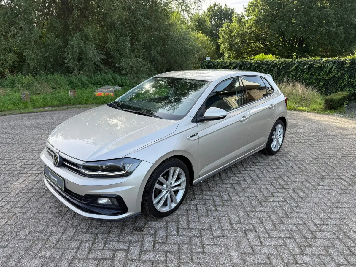 1.0 TSI R-LINE PDC I CARPLAY I CRUISE I LEER I CLIMA I 1E EIG I UNIEK