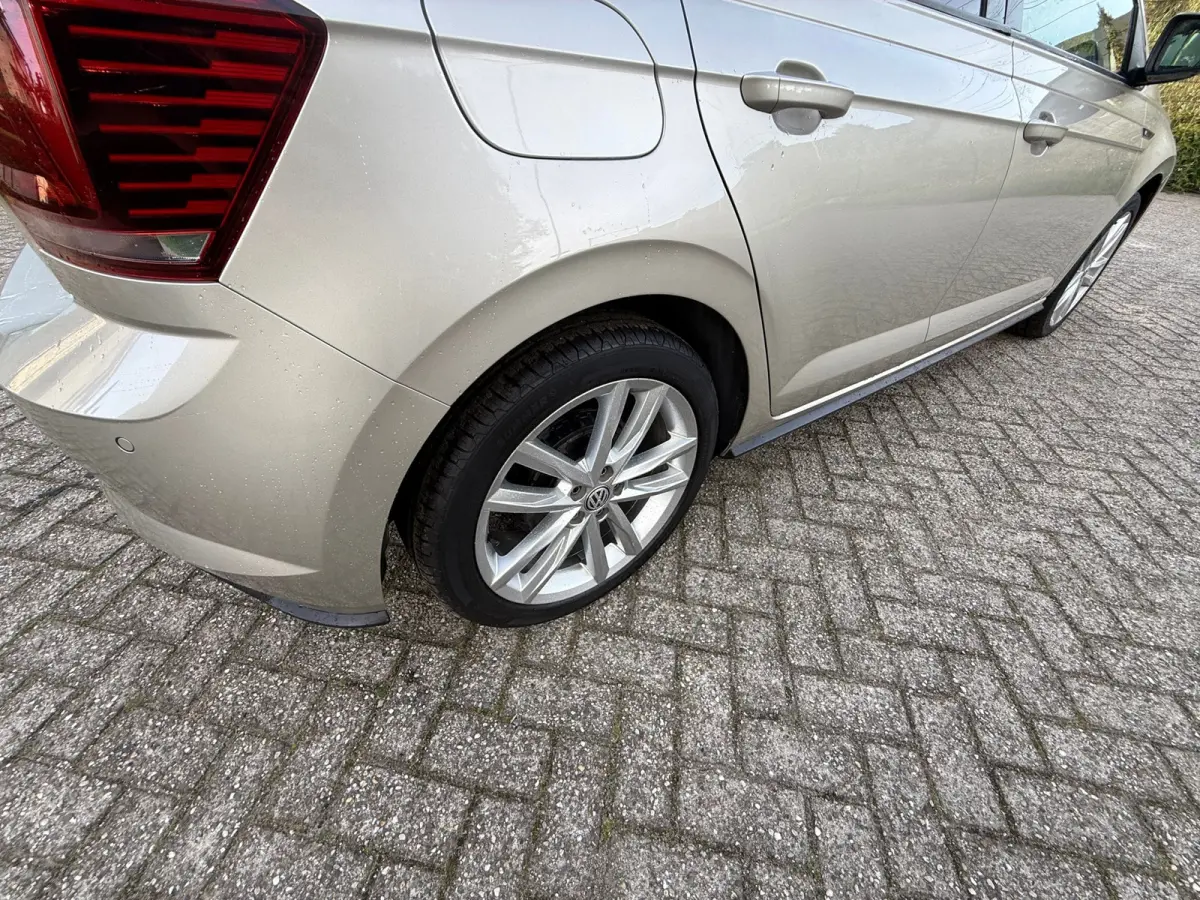 1.0 TSI R-LINE PDC I CARPLAY I CRUISE I LEER I CLIMA I 1E EIG I UNIEK