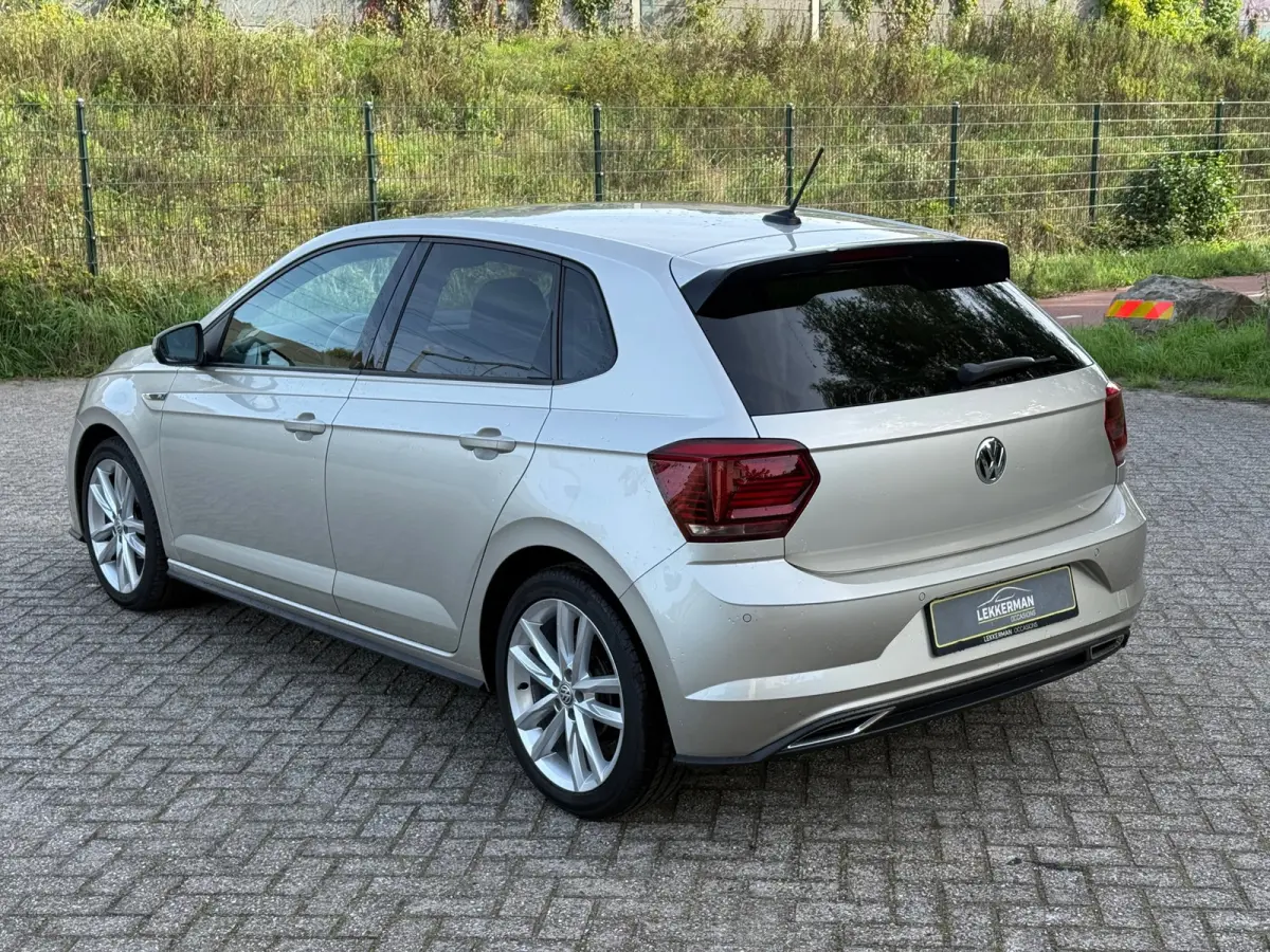 1.0 TSI R-LINE PDC I CARPLAY I CRUISE I LEER I CLIMA I 1E EIG I UNIEK
