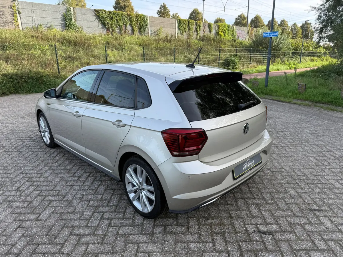 1.0 TSI R-LINE PDC I CARPLAY I CRUISE I LEER I CLIMA I 1E EIG I UNIEK