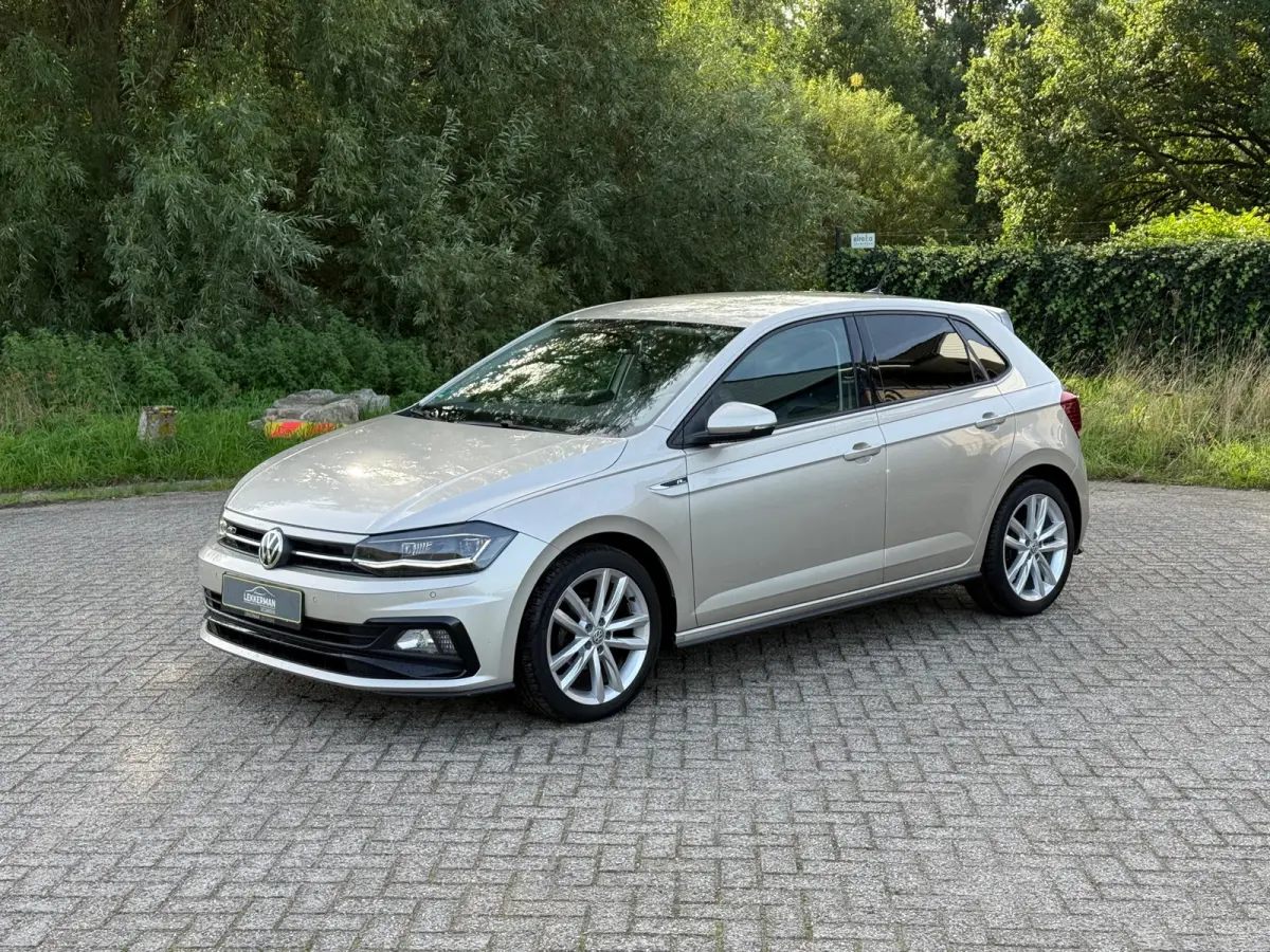 1.0 TSI R-LINE PDC I CARPLAY I CRUISE I LEER I CLIMA I 1E EIG I UNIEK
