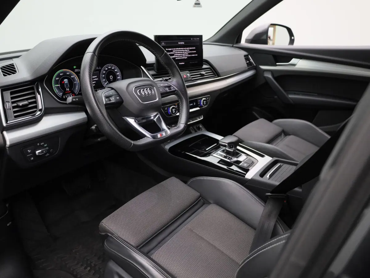 50 TFSI e S edition | S-line | Vlak Stuur | Automaat | LMV | Half Leder | Camera | Trekhaak | Virtual cockpit | Climate control | Stoel verwarming | Navigatie | DAB |