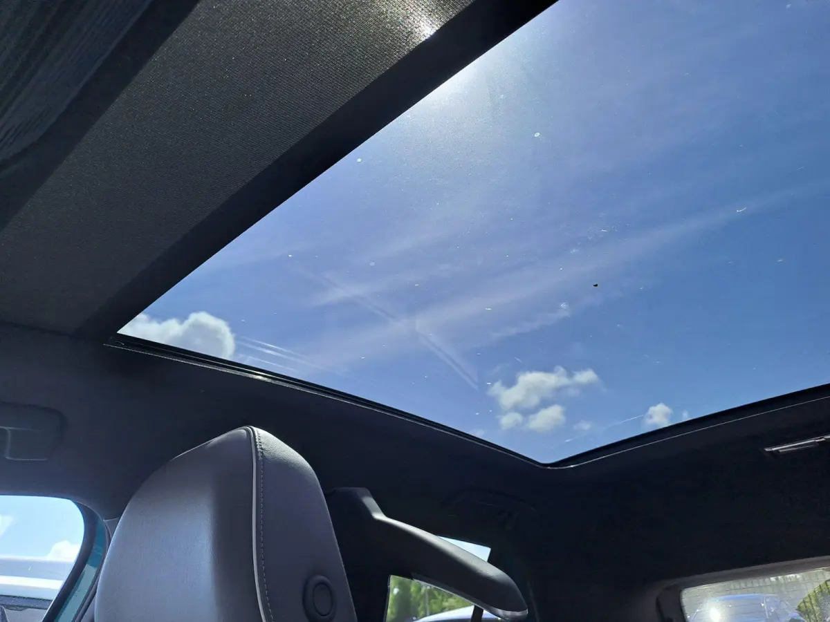 First Max 58 kWh 204 PK | SoH ..% | Automaat | Panoramdak | Navigatie | Camera | Head-up display | Keyless Access | Climatronic | Adaptive Cruise Control | Apple Carplay | Android Auto |