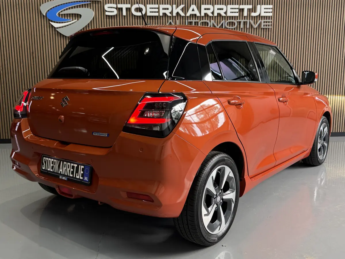 1.2 Comfort + Hyb | Aut | Navi | 16" | Carplay | Stoelverwarming | ACC | Dodehoek | 100% Suzuki Onderhouden!