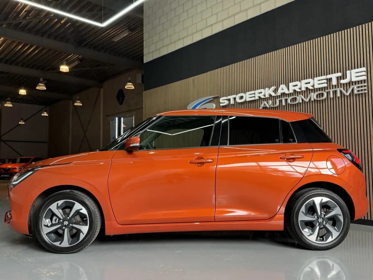 1.2 Comfort + Hyb | Aut | Navi | 16" | Carplay | Stoelverwarming | ACC | Dodehoek | 100% Suzuki Onderhouden!