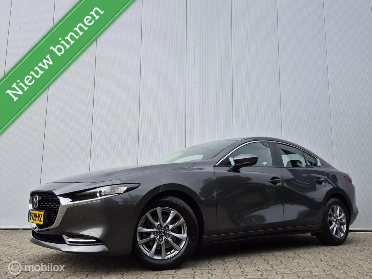 2.0 E-SKYACTIV-X M HYBRID 180 COMFORT MET BOSE AUTOMAAT/KEYLESS/LED/CAMERA/STOEL-STUURVERWARMING/HEAD-UP/ADAPTIVE CRUISE