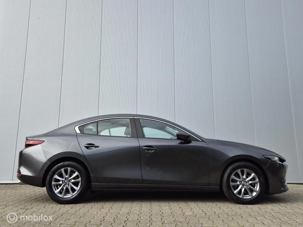 2.0 E-SKYACTIV-X M HYBRID 180 COMFORT MET BOSE AUTOMAAT/KEYLESS/LED/CAMERA/STOEL-STUURVERWARMING/HEAD-UP/ADAPTIVE CRUISE