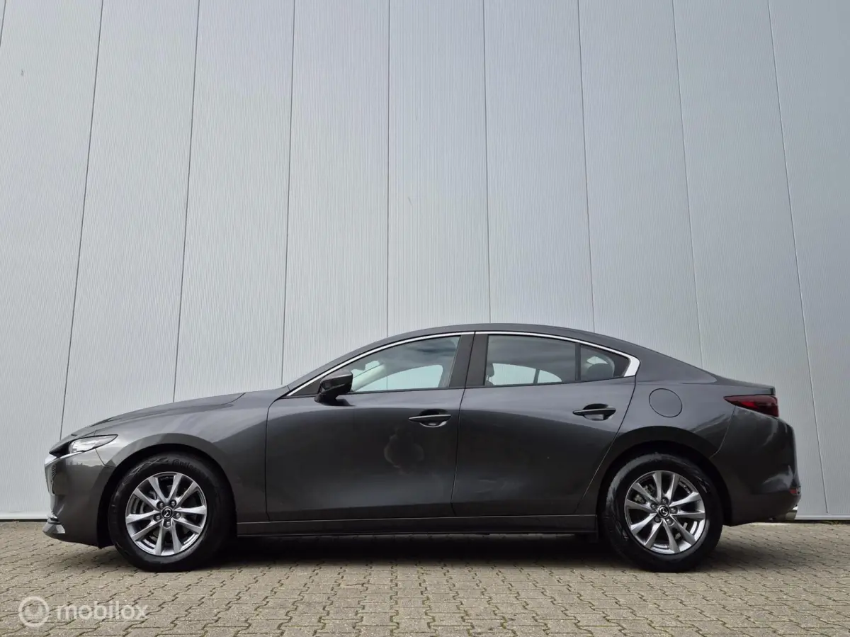 2.0 E-SKYACTIV-X M HYBRID 180 COMFORT MET BOSE AUTOMAAT/KEYLESS/LED/CAMERA/STOEL-STUURVERWARMING/HEAD-UP/ADAPTIVE CRUISE