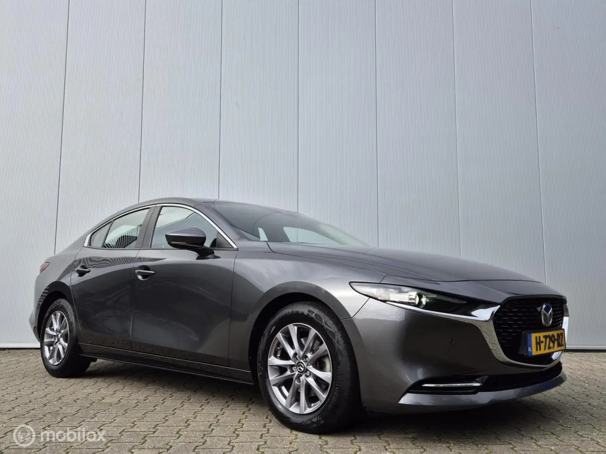 2.0 E-SKYACTIV-X M HYBRID 180 COMFORT MET BOSE AUTOMAAT/KEYLESS/LED/CAMERA/STOEL-STUURVERWARMING/HEAD-UP/ADAPTIVE CRUISE