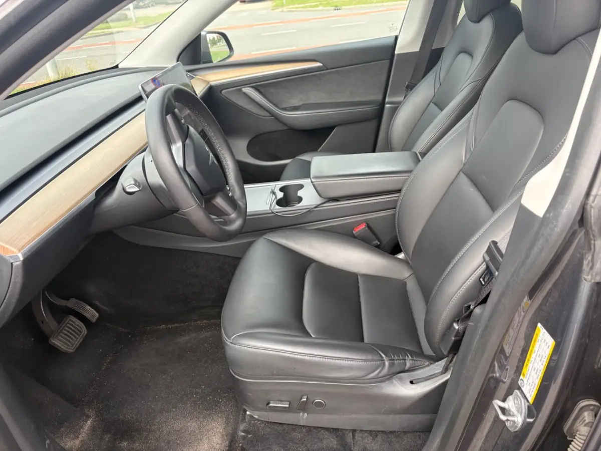 Long Range AWD 75 kWh l 514PK | SOH 91% l Leder l 360gr Camera l Navigatie l Stoel en stuurverwarming l Pano Dak l 19" l