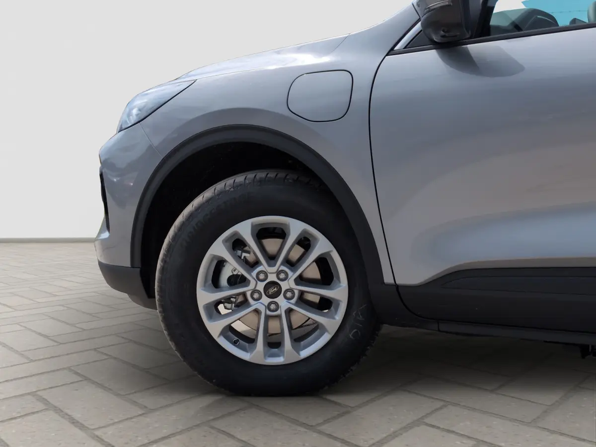 2.5 PHEV Titanium | Achterbank verwarmd | Achteruitrijcamera | All Weather banden