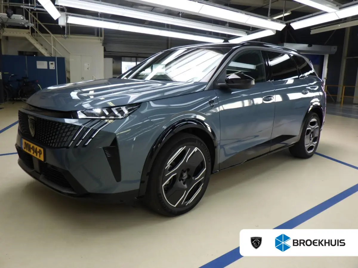 GT Exclusive 73 kWh 7p | Fase 3 laden | SOH 99% | Lederen bekleding | Massage | Trekhaak | 20 Inch | NL auto |