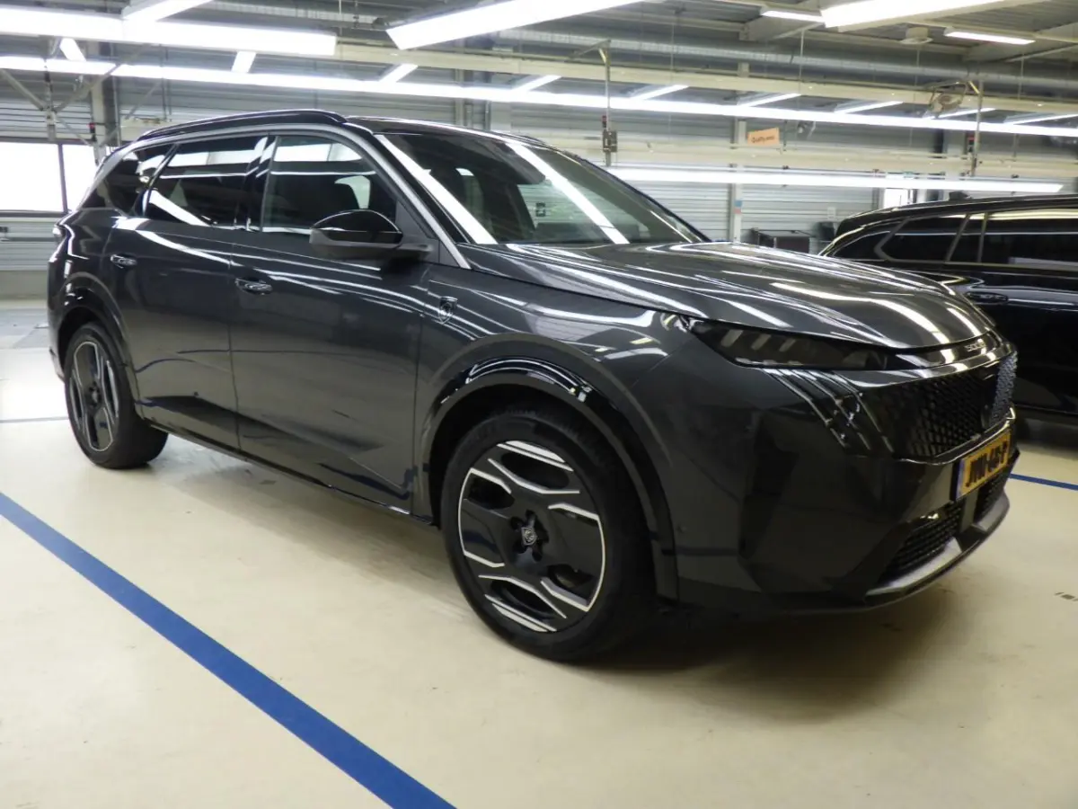 GT Exclusive 73 kWh 7p | Fase 3 laden | SOH 100% | Panorama/schuifdak | Lederen bekleding | Trekhaak | Massage | NL auto |