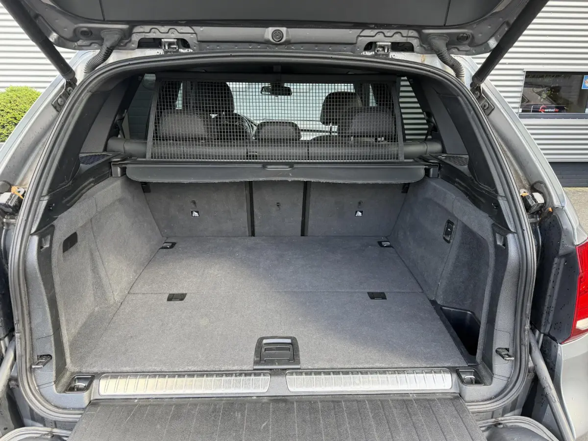 xDrive40e iPerformance High Executive M-Sport | Navigatie | Parkeersensoren | Sportstoelen | Stoelverwarming |
